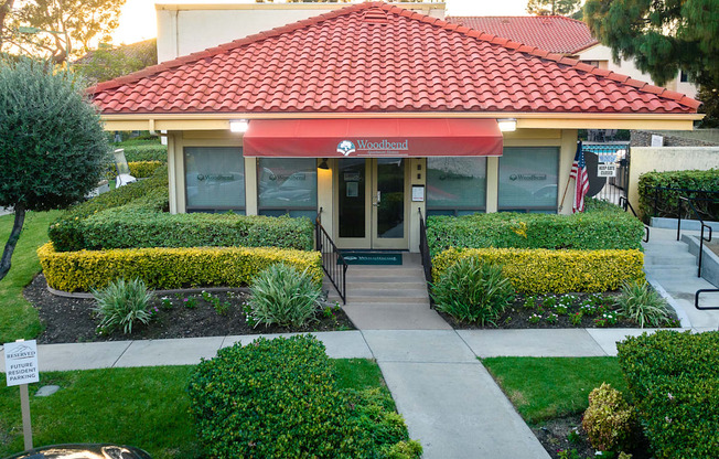 Leasing office entrance at Woodbend, Alta Loma