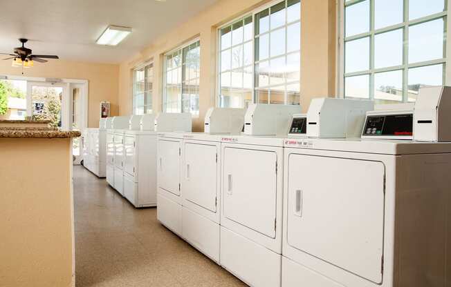 Laundry Room at Country Village Apartments, Jurupa Valley, CA 91752