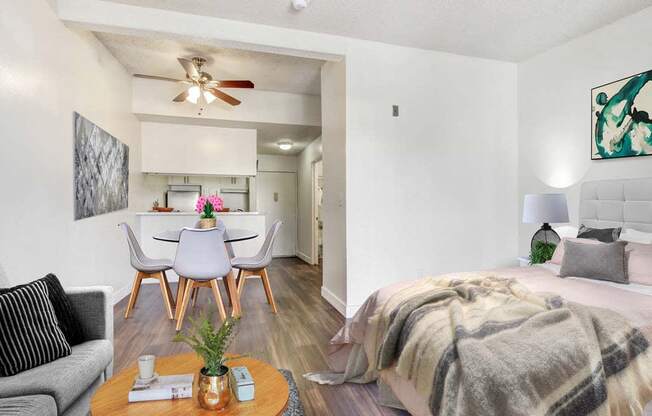 a bedroom with a bed and a ceiling fan  at Sherway Villa, Reseda, CA