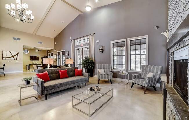 a living room with gray walls and a fireplace