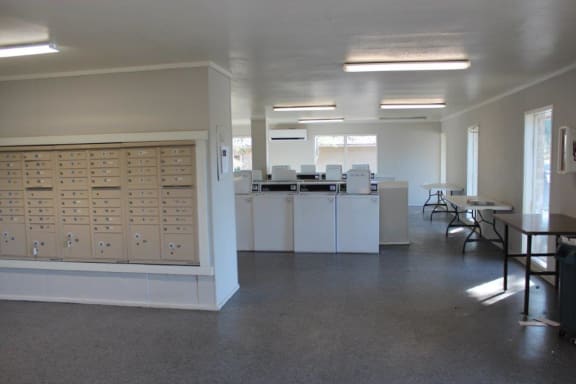 mail room with laundromat