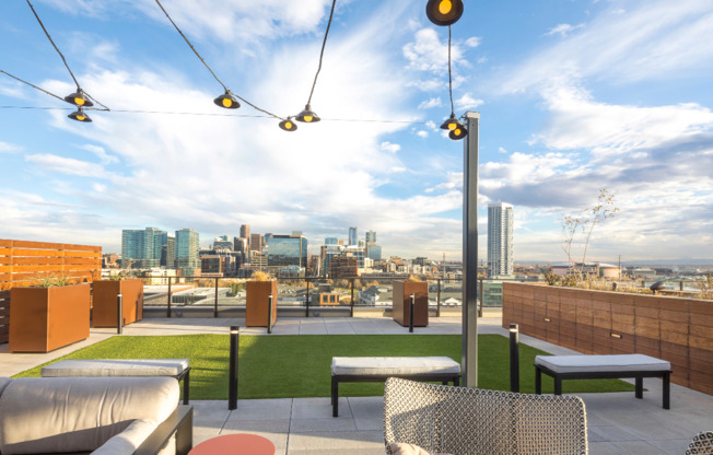 Rooftop Deck Lounge Area with Panoramic Views of the City
