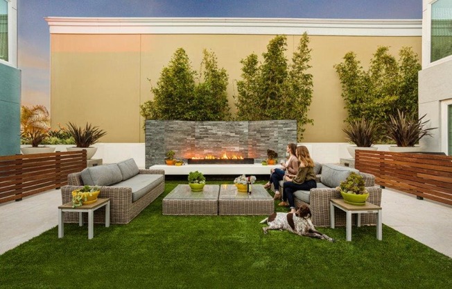outdoor lounge area with fire pit