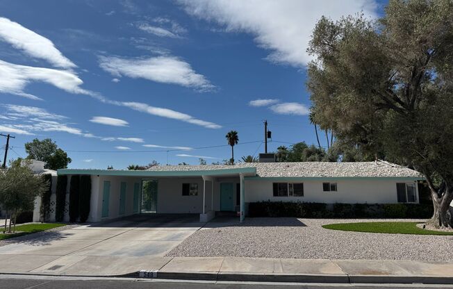 Mid-Century Modern Home at its finest. In ground pool and hot tub.