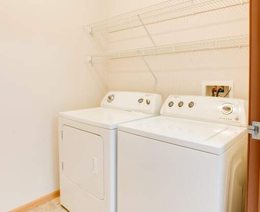 a washer and dryer in the laundry room of a home