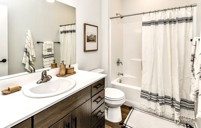 Studio, one two and three bedroom apartments and townhomes featuring open concept floor plans, dens, large windows, stainless steel appliances, quartz countertops, eat-in kitchens, pantries, LVT flooring and much more at The Trails at North Streams in Omaha, NE