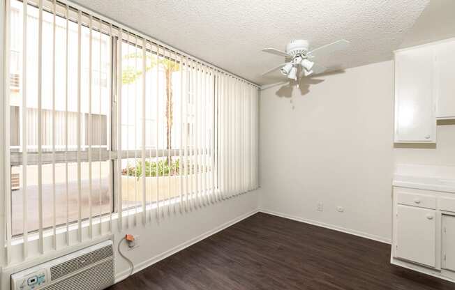 Dining Room with Hardwood Floors and Fan