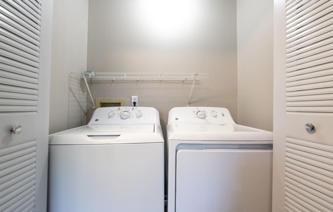 Laundry Area in the Three Bedroom Townhome at Woodbridge Apartments Bloomington