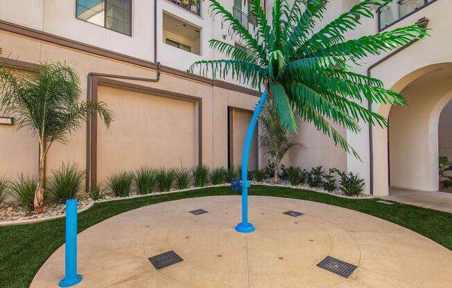 a tree in front of a building