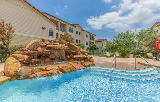 a house with a large pool of water