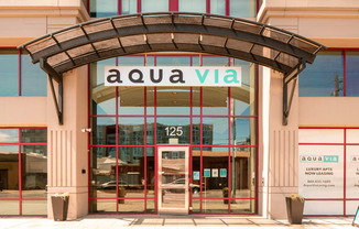 Aqua via entry way with property sign