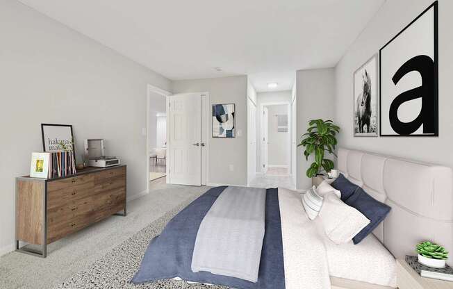 A bedroom with a bed, a dresser, and a plant.