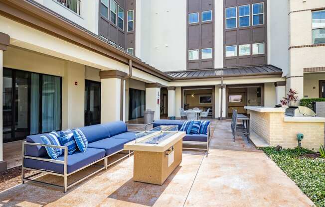 the preserve at ballantyne commons commons lobby with couches and a fire pit