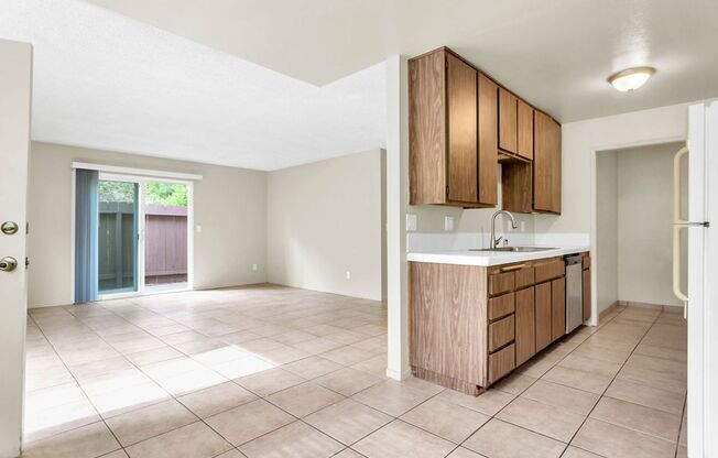 Great three bedroom/two bath single level corner townhome in UTC!