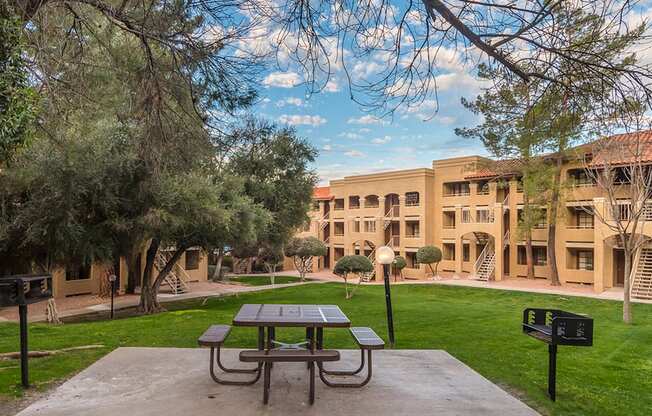 Foothills with nice lush landscape throughout and BBQ area