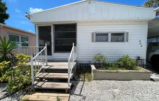 55+ Fair Lane Acres Community. 2 Bed, 2 Bath Mobile Home with 1-Car Carport. Close to Beaches & Nearby Attractions!