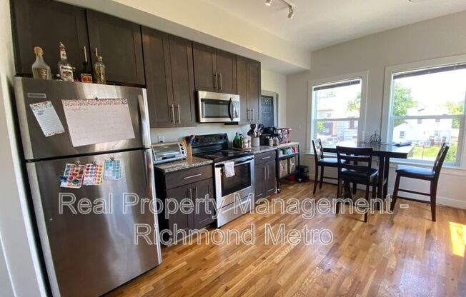 311 W 13 ST 309 W