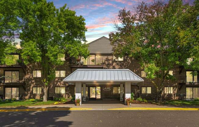 Laurel West End Apartments in Golden Valley, MN photo of a large building with trees in front of it