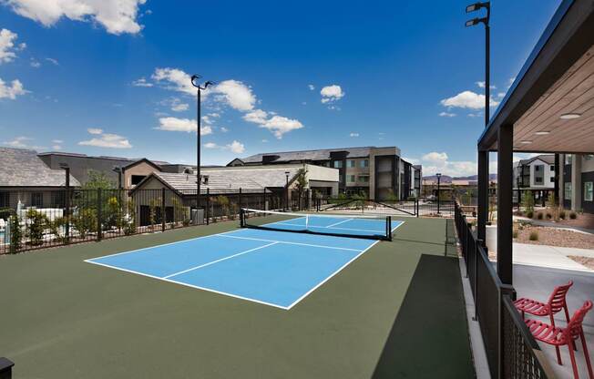 the tennis court at the club at highlands apartments