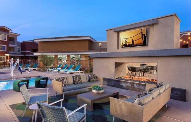 a patio with couches and chairs and a fire place at Zaterra Luxury Apartments, Chandler, AZ, 85286