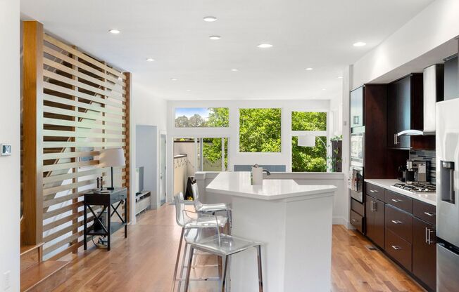 Modern 4BR/3.5BA Duplex with Finished Basement & Solar in Prime Denver Location