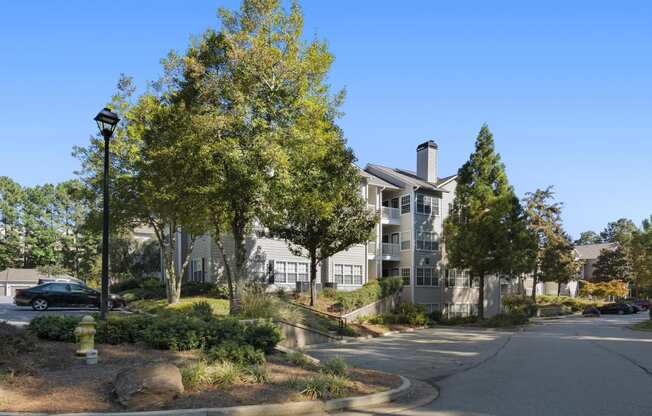 Building exterior and landscaping at Park Summit Apartments in Decatur, GA 30033