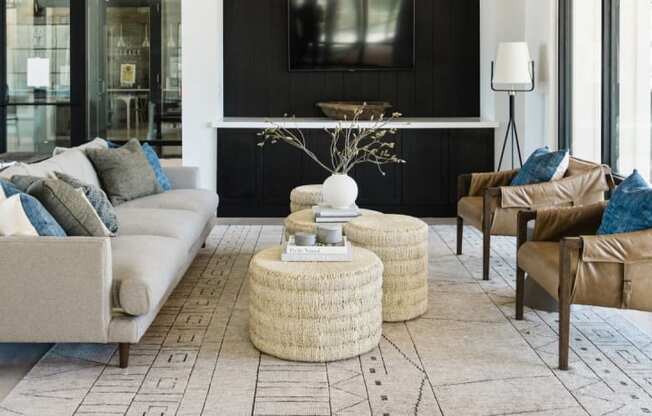 a living room with a couch and chairs and a table at Legacy at Cibolo, Texas