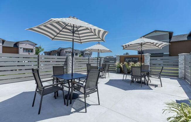 a group of lawn chairs sitting on top of a table