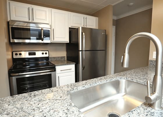 kitchen appliances, granite countertop