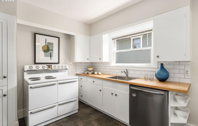 Charming 2-Bedroom Gem with Spacious Living Room with Fireplace + Bright Open Kitchen