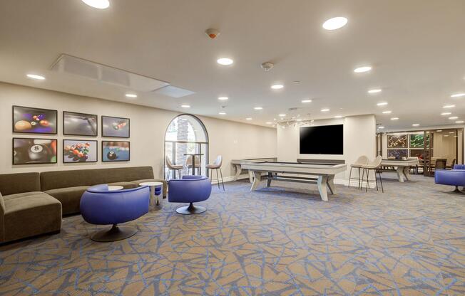 a room filled with furniture and a blue chair
