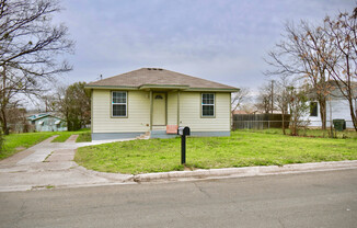 Darling Single Family Home Features; Tile Flooring Through Out, Granite Counter Tops AND MORE!