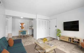 A living and dining room with plush carpeting  at Apple Ridge Apartments, Walker, MI