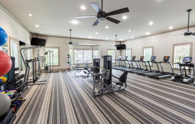 our state of the art fitness room includes cardio machines and weights