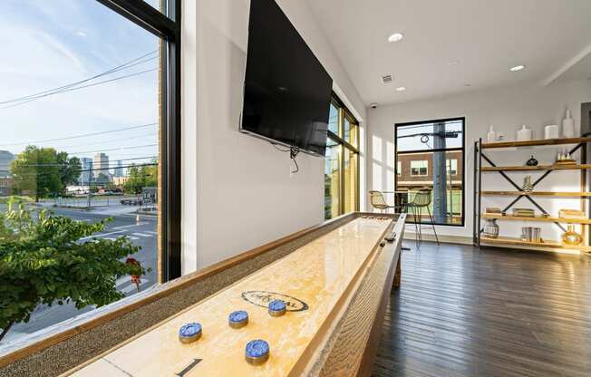 a kitchen with a counter and a large window