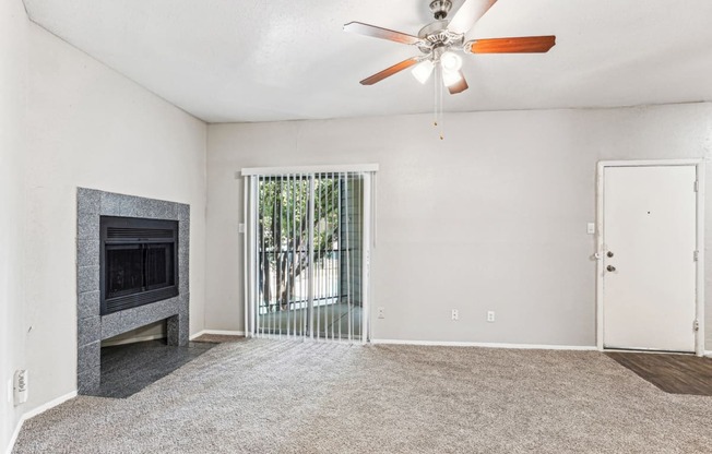 Bright and inviting living room with ample natural light at Laurels of Sendera apartments in Arlington, TX