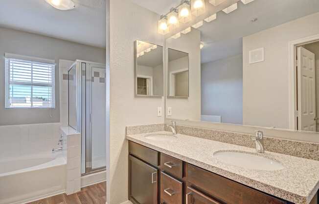 Quartz or Granite Counters and Custom Cabinetry in Bathrooms at Windsor at Aviara, Carlsbad, California