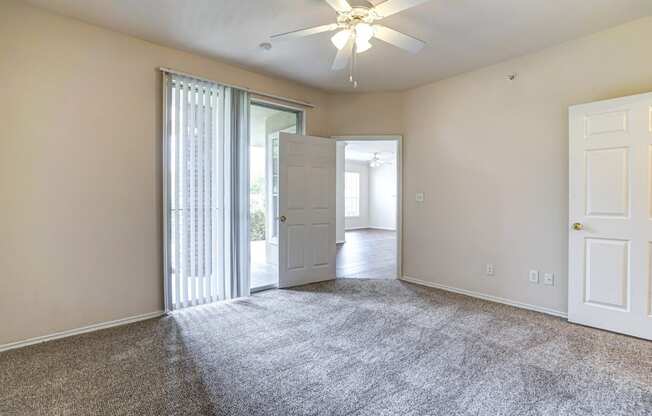 Spacious and bright bedrooms at Turnberry Isle Apartments in Dallas, TX.