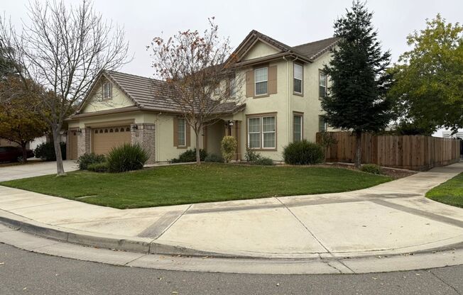 Lovely 5/3 with a desirable downstairs bedroom.