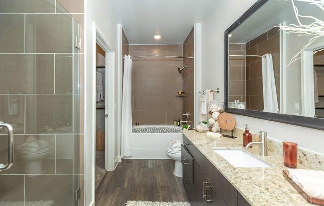 a room with a sink and a mirror