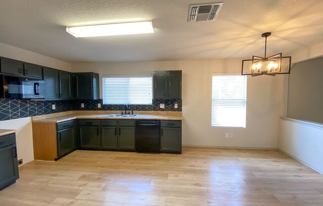 1 STORY 3 BEDROOM WITH AN OFFICE AND 2 BATHROOM.