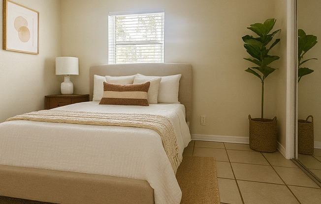 3/2 home available in Bunche Manor featuring a fenced yard, screened enclosure, den, and a spacious bonus room