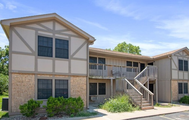 an exterior view of a building with stairs