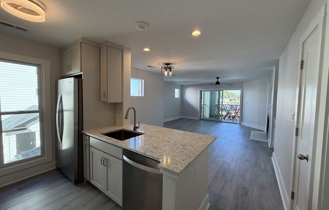 Breathtaking 2 Bed/2 Bath Condo - Second Floor - Newly Renovated - Covered Balcony - Community Amenities - Washer/Dryer Included