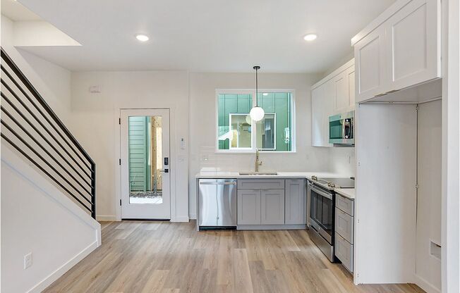 Inviting Home with Open Living & Stainless Steel Kitchen