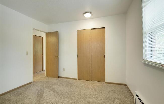 Northeast Villas Apartments in Fridley, MN Carpeted Bedroom