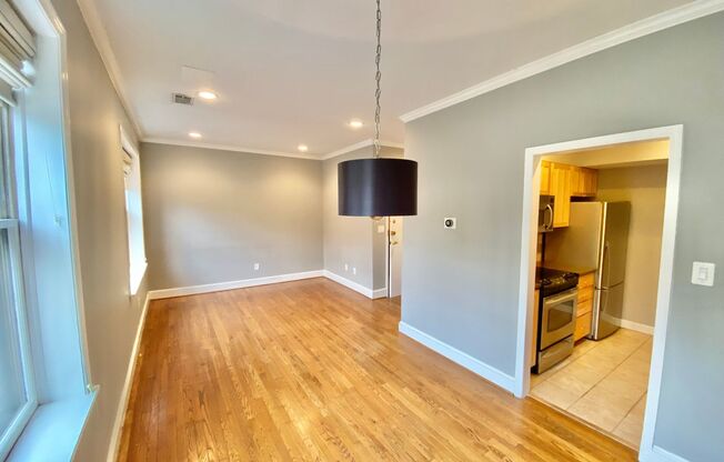 Logan/Dupont 1BR 1BA unit with hardwood floors, W/D and a balcony!
