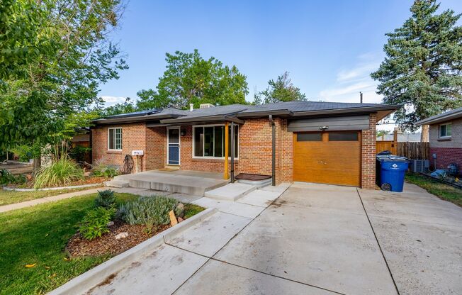 Spacious 4-Bedroom Home with Updated Kitchen, Finished Lower Level & Huge Backyard