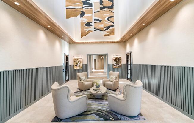 Striking ceiling details and cozy conversation seating make this lounge a stylish and welcoming retreat within the Modera South Shore clubhouse.