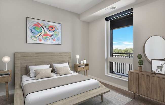 a bedroom with a large window and a bed with a wooden headboard
